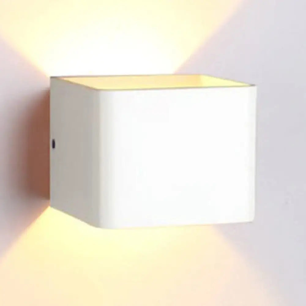 Modern minimalist cube shade sconce light in white with warm diffused glow perfect for black and white living room decorbites minimalist cube