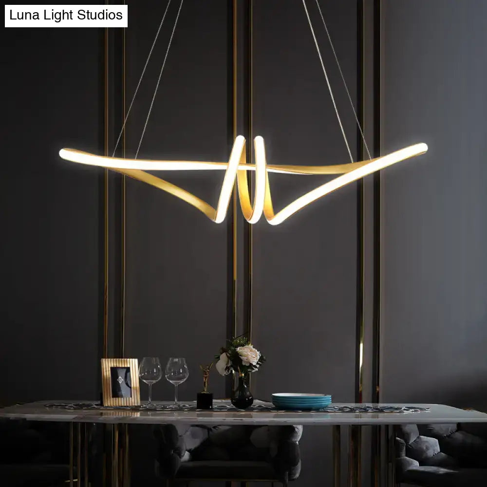 DecorBites minimalist gold finish twist island light fixture with sleek curved arms and warm LED glow for restaurants