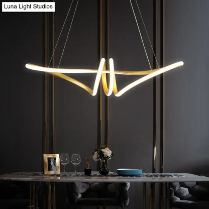 DecorBites minimalist gold finish twist island light fixture with sleek curved arms and warm LED glow for restaurants