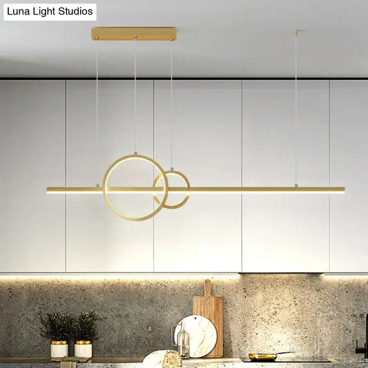 DecorBites™ minimalist gold-toned ceiling light with intersecting rings and warm third gear for kitchen island use