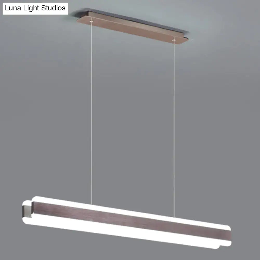 Modern minimalist decorbites™ led island pendant with linear acrylic hanging light and dark wood-grain accents for dining room
