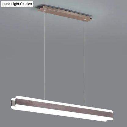 Modern minimalist decorbites™ led island pendant with linear acrylic hanging light and dark wood-grain accents for dining room