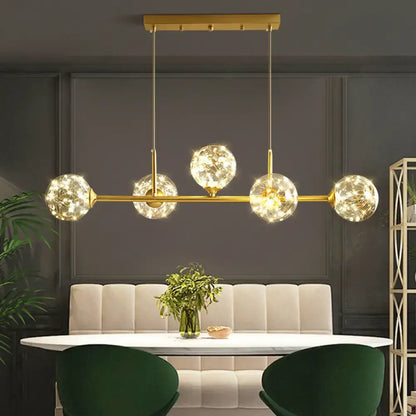 DecorBites™ gold-toned minimalist ceiling light with five clear glass sphere shades and brass finish LED pendant light