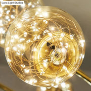 Decorbites™ minimalist led pendant ceiling light with clear glass sphere shade and warm glowing fairy lights inside