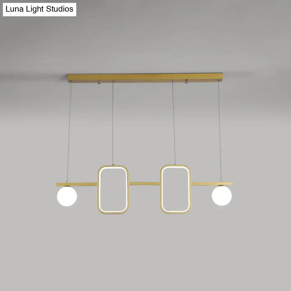 Modern gold-toned DecorBites minimalist metal pendant light with symmetrical geometric LED and cream glass shade including remote control stepless features