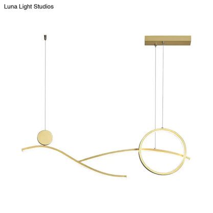 Modern gold-toned minimalist metal LED hanging light with curved geometric elements for dining room and kitchen island
