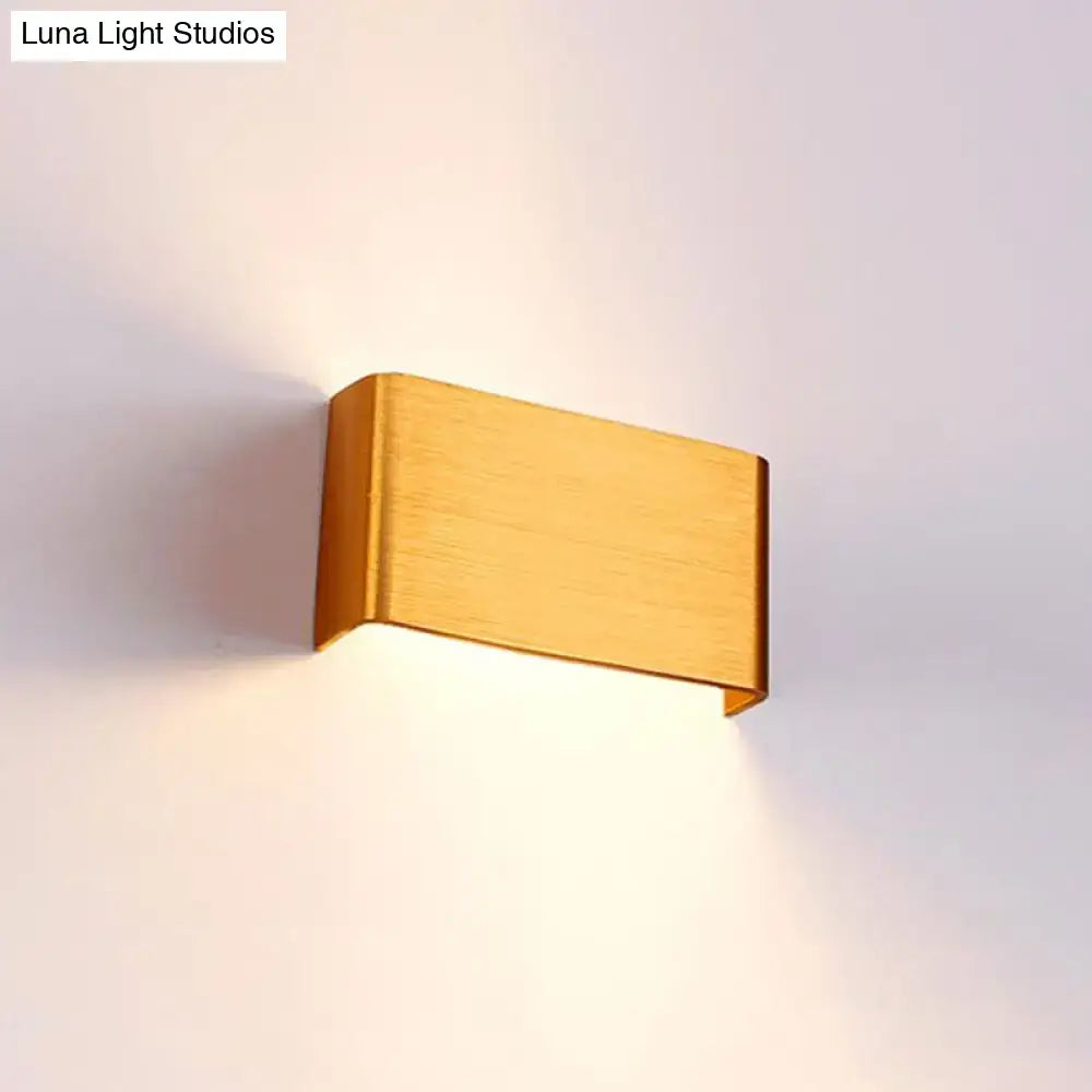 Gold-finished rectangular wall lamp with sleek modern design for living room warm white lighting