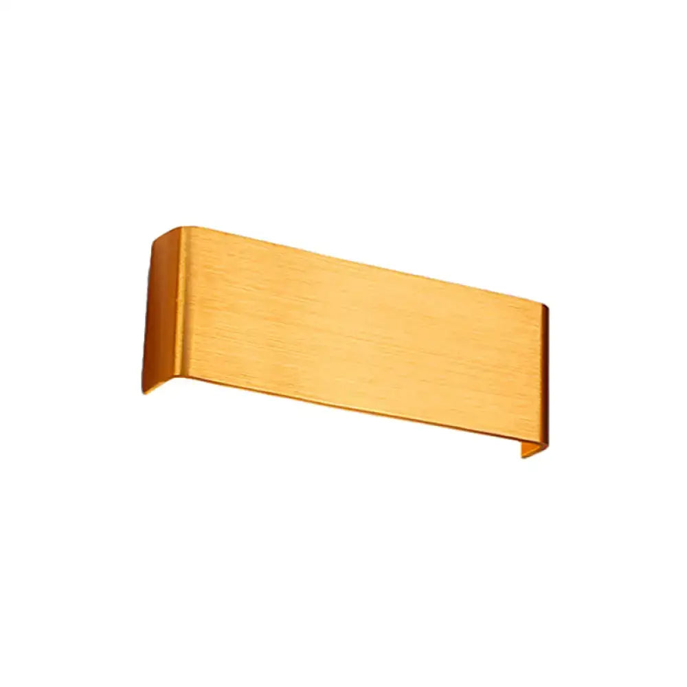 Gold-colored rectangular wall lamp with brushed metal finish for living room featuring warm white led light