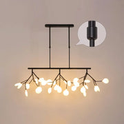 Black metal branch-style acrylic twig ceiling pendant light with frosted glass globe bulbs for dining room use