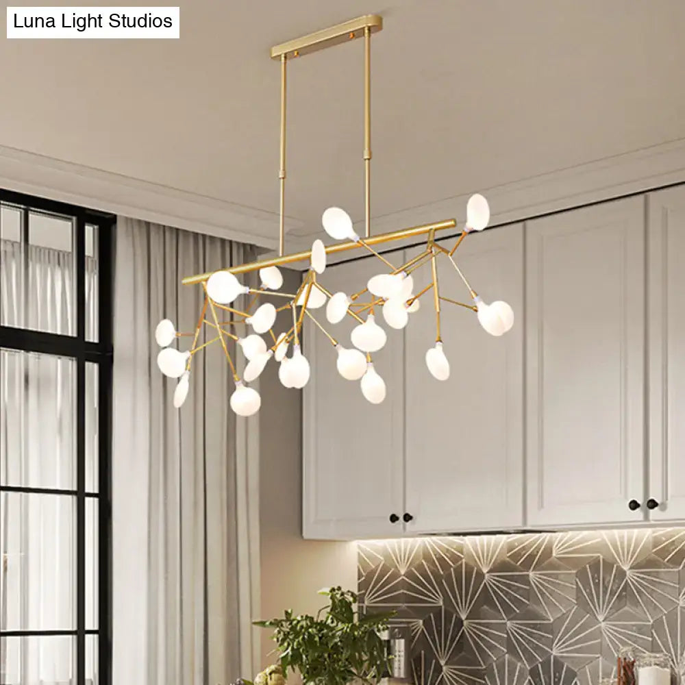 Gold-toned DecorBites™ minimalistic acrylic twig ceiling pendant with frosted glass globes for dining room lighting