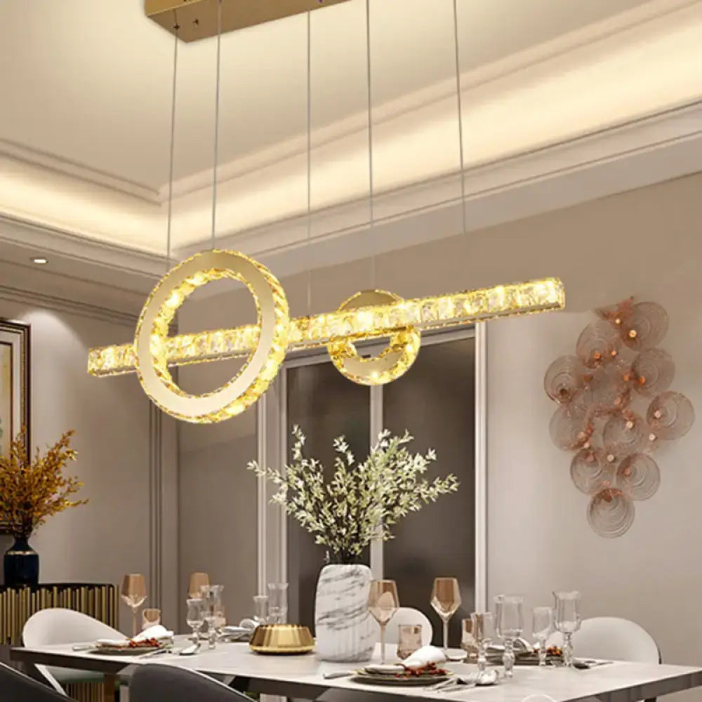 Gold-toned decorbites™ minimalistic pendant light with beveled cut crystals compatible with 110v-120v and 220v-240v