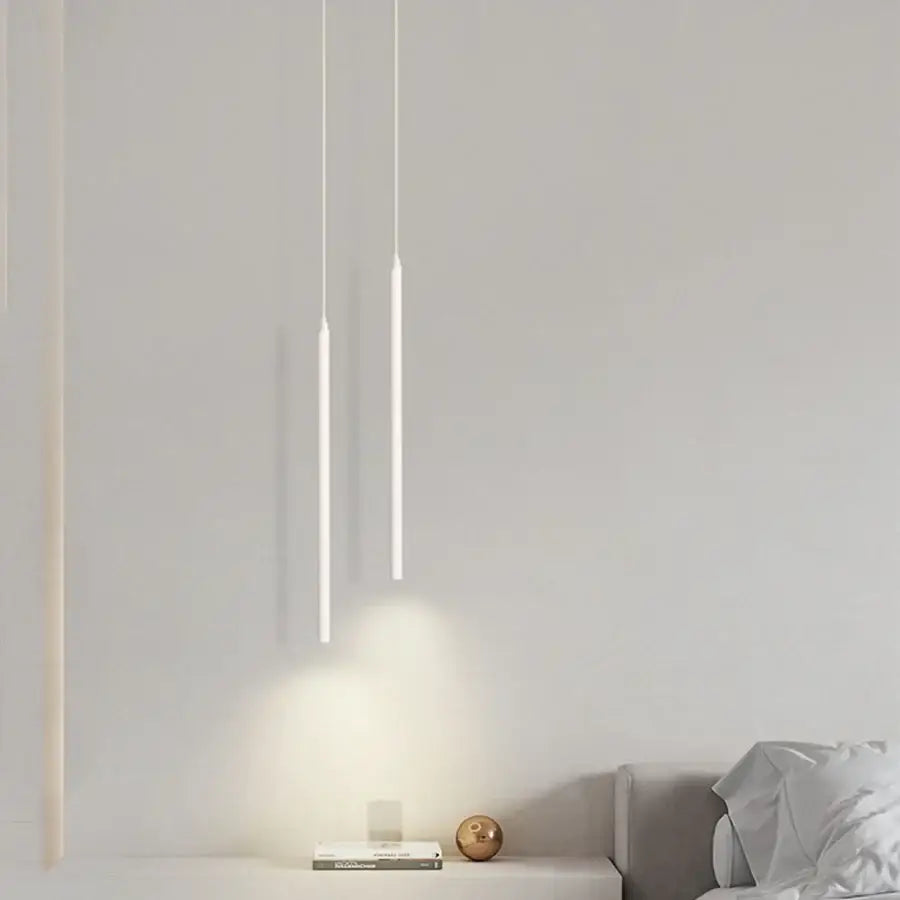 Two minimalist white 2cm led pendant lights by decorbites modern design casting soft glow for kitchen island use