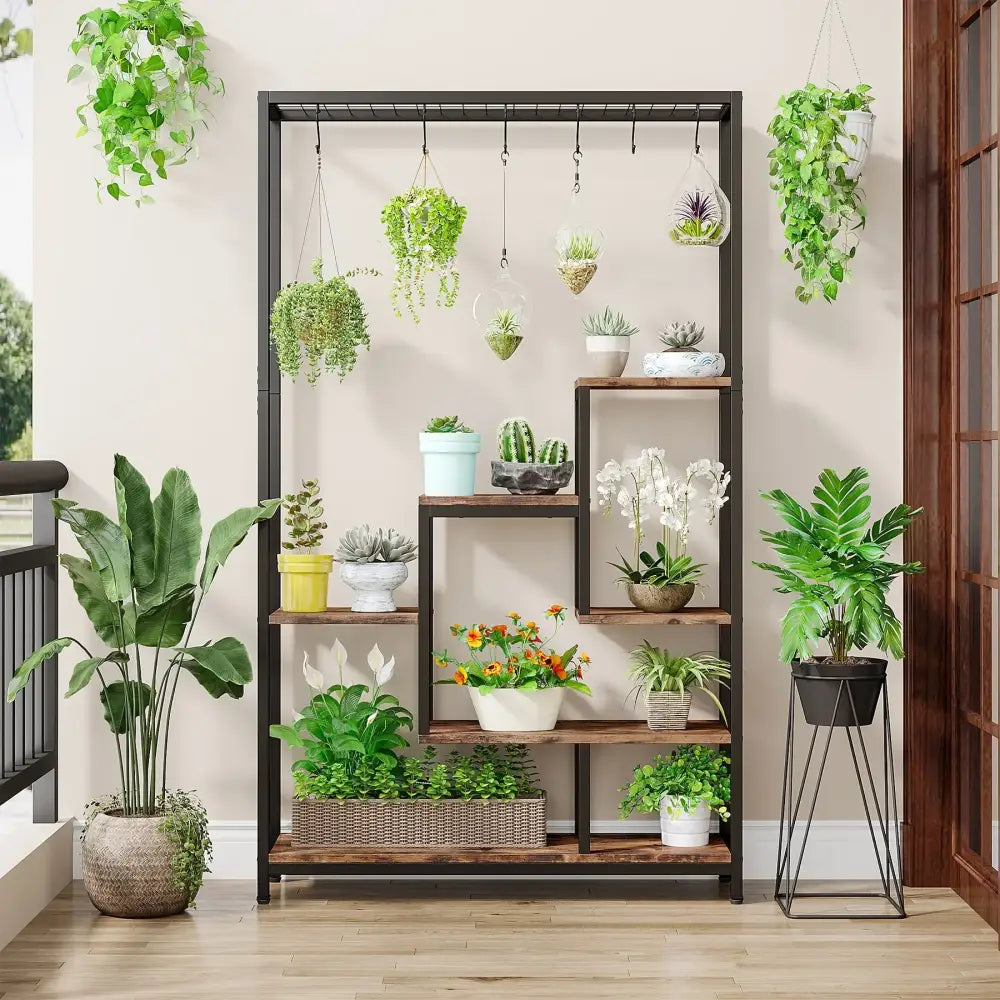DecorBites modern 5-tier tall black metal plant stand with wood shelves holding multiple potted plants