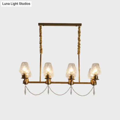 Decorbites modern ceiling light with brass finish, five textured glass shades, and dangling crystal pendants