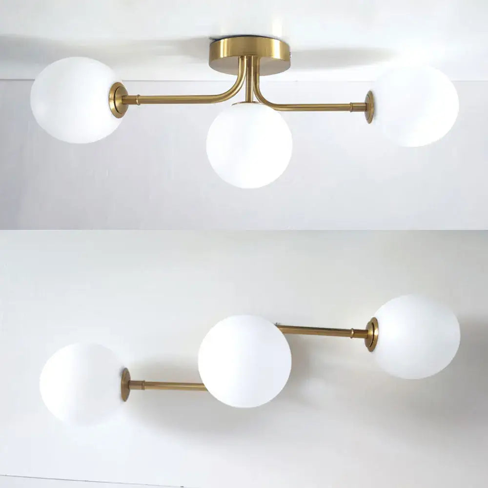 DecorBites modern acrylic ball ceiling light with brass finish and three frosted white glass globes for home use