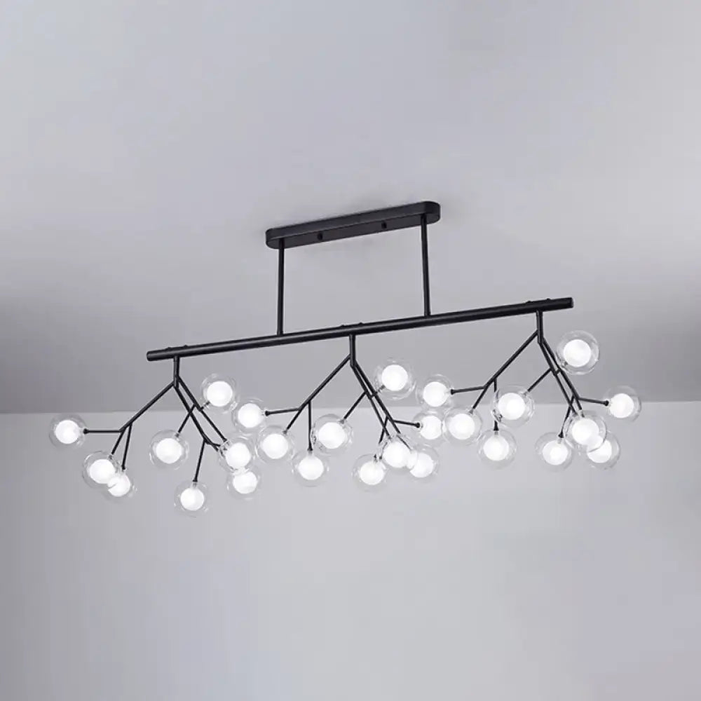 Black metal firefly island pendant chandelier with multiple clear glass globe bulbs in a branching tree-like design