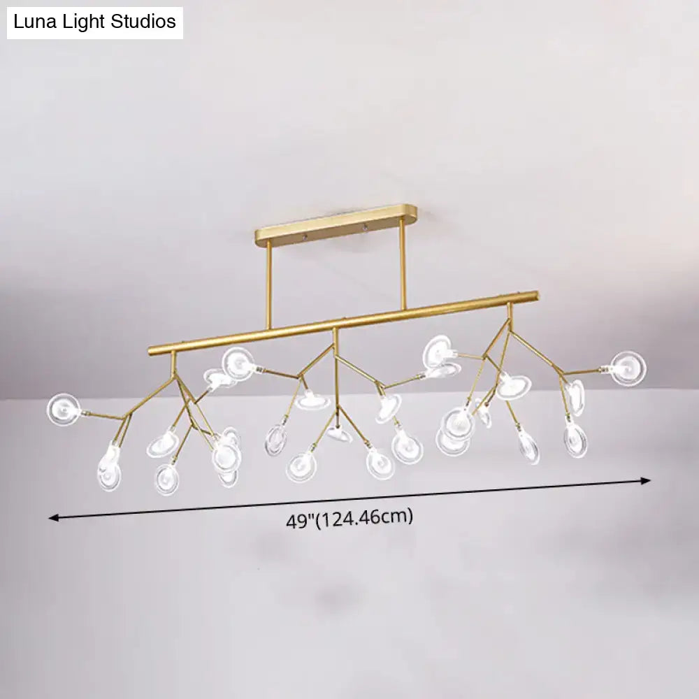 Gold-toned firefly island pendant chandelier with branching arms and clear glass globe shades for dining room lighting