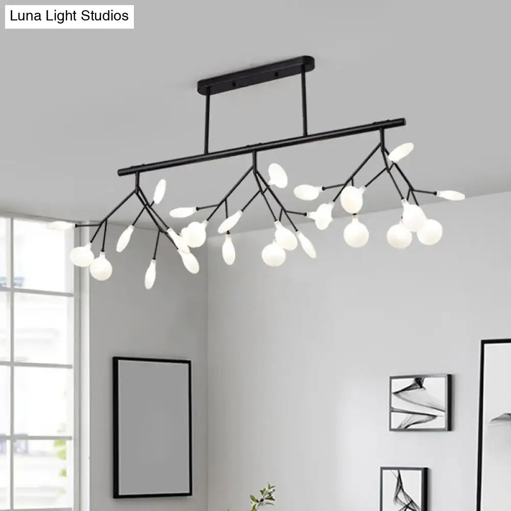 Black metal firefly island pendant with branching arms and frosted glass globe bulbs for modern dining rooms