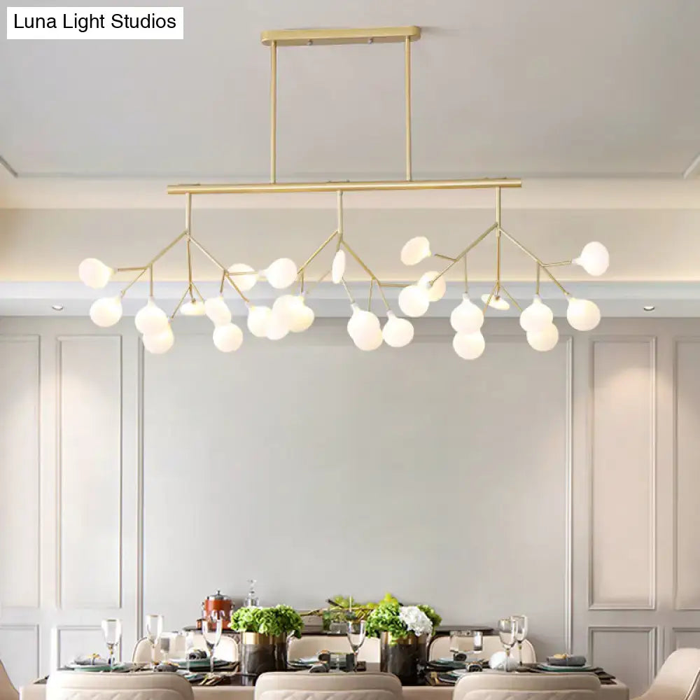 Gold-toned decorbites™ modern acrylic led pendant light fixture with 27 frosted glass globes for living room lighting