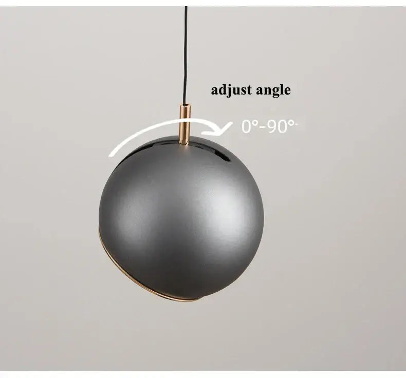 Matte black spherical decorbites™ modern adjustable led pendant light with brass accent and adjustable hanging mechanism