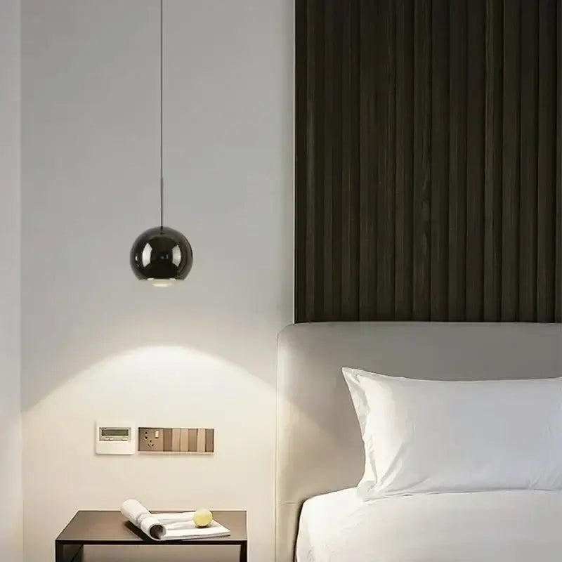 Decorbites™ modern adjustable led pendant light black spherical with polished metallic finish hanging from ceiling