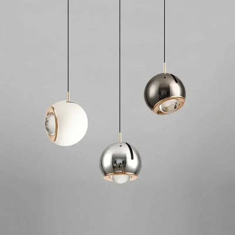DecorBites™ modern adjustable led pendant light featuring three polished metallic spherical lights with gold accents