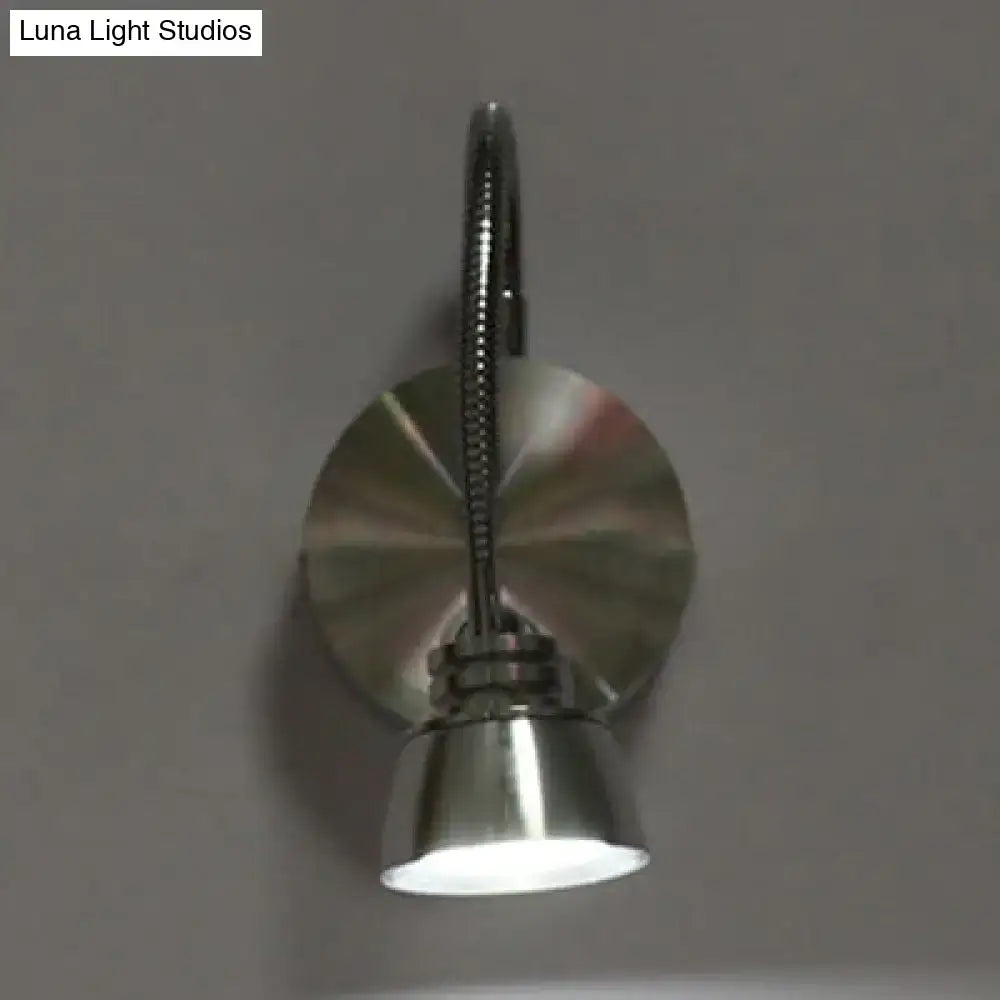 A sleek modern chrome led wall light with adjustable arm and polished aluminum finish for bedroom decorbites lighting