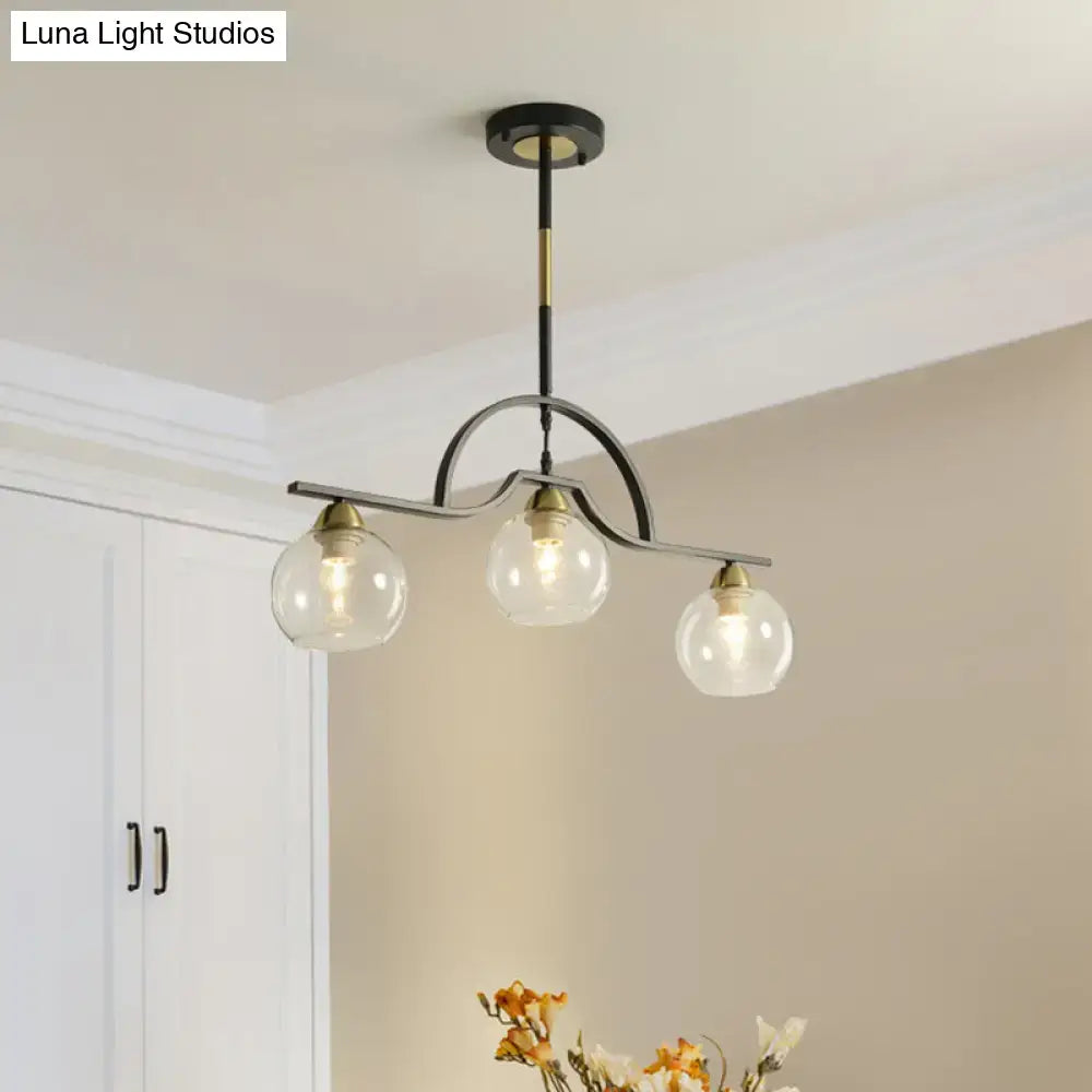 DecorBites™ modern arched island pendant light with clear white glass globes and black brass industrial finish, 3 lights