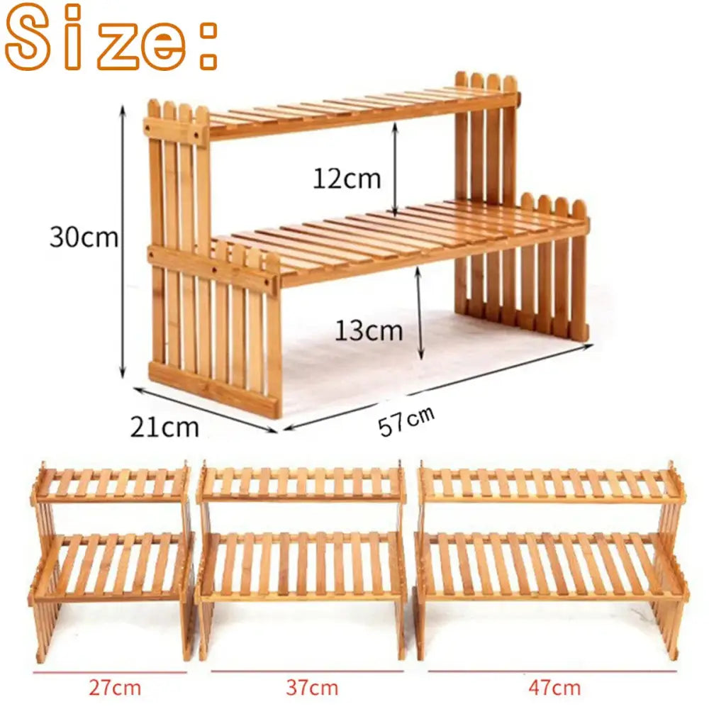 Light brown bamboo DecorBites modern 2-tier plant display stand with fence-like design and slatted shelves for plant display