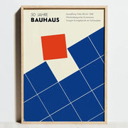 A minimalist framed poster from decorbites™ featuring bold geometric bauhaus exhibition posters in red blue and cream