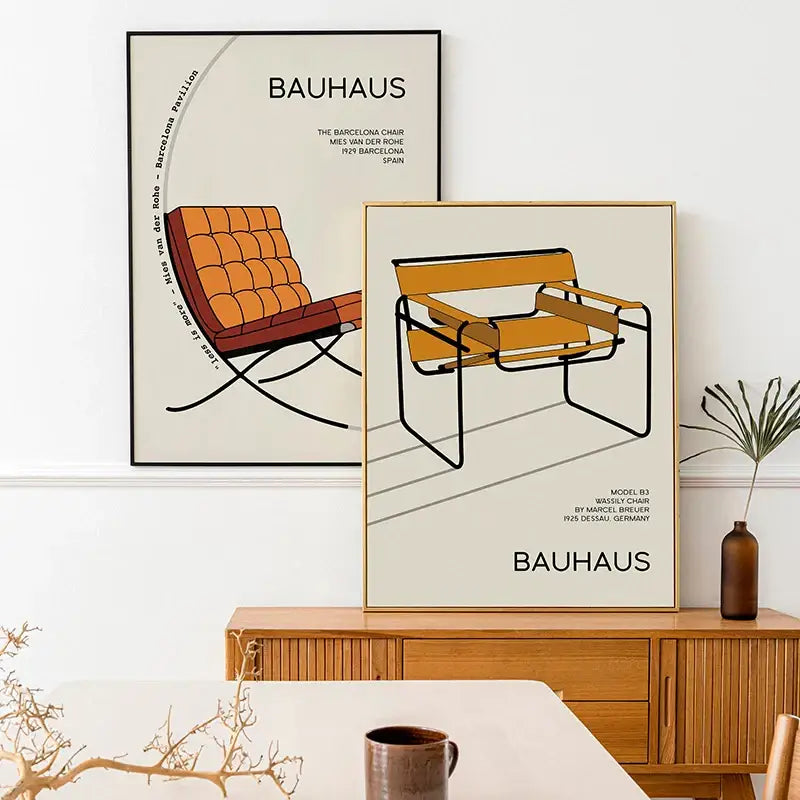 Two framed bauhaus exhibition posters featuring an orange tufted barcelona chair and a yellow wassily chair with black metal frame