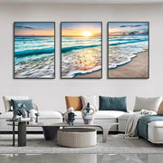 Set of three framed modern beach sunset canvas panels featuring warm sunset colors for wall decor by decorbites