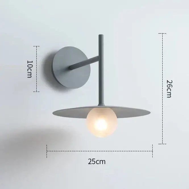 DecorBites™ modern bedside wall light in matte gray with a sleek minimalist design and illuminated bulb cradle