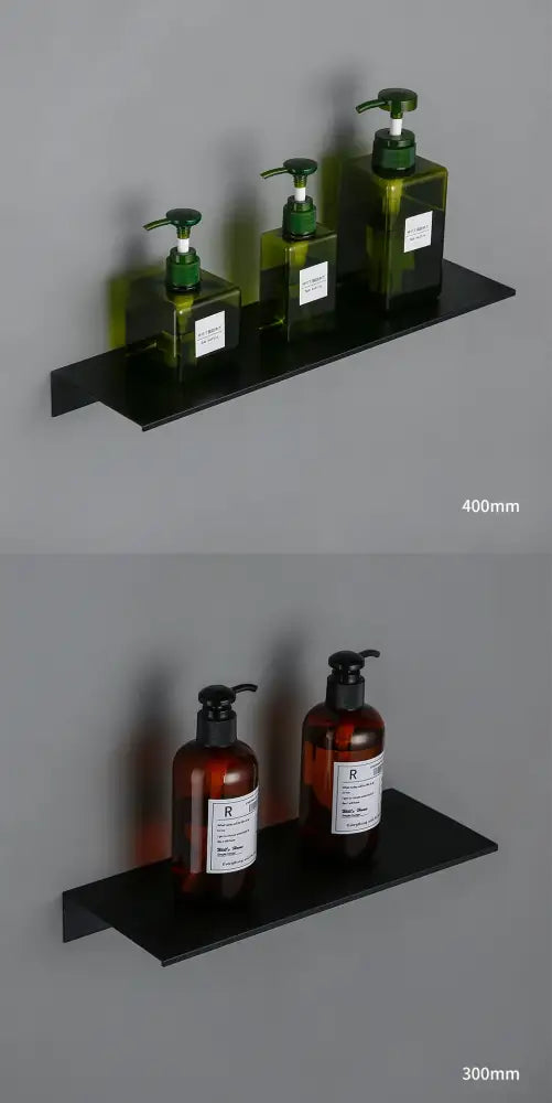 Decorbites™ modern black and white aluminum alloy wall-mounted organizer shelf holding green and amber glass pump bottles