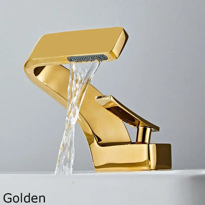 Golden modern faucet with sleek angular design and polished metallic finish for modern black bathroom sink use