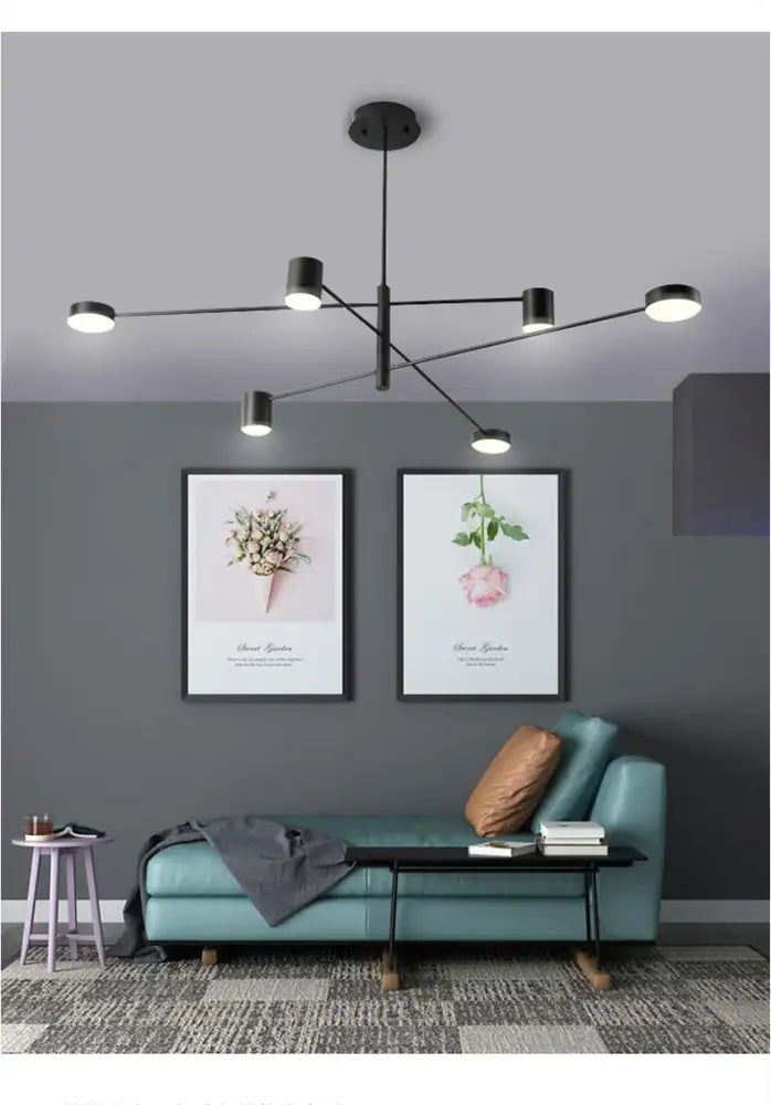 Modern black chandelier by DecorBites with multiple circular light fixtures in simple black nordic style home lighting