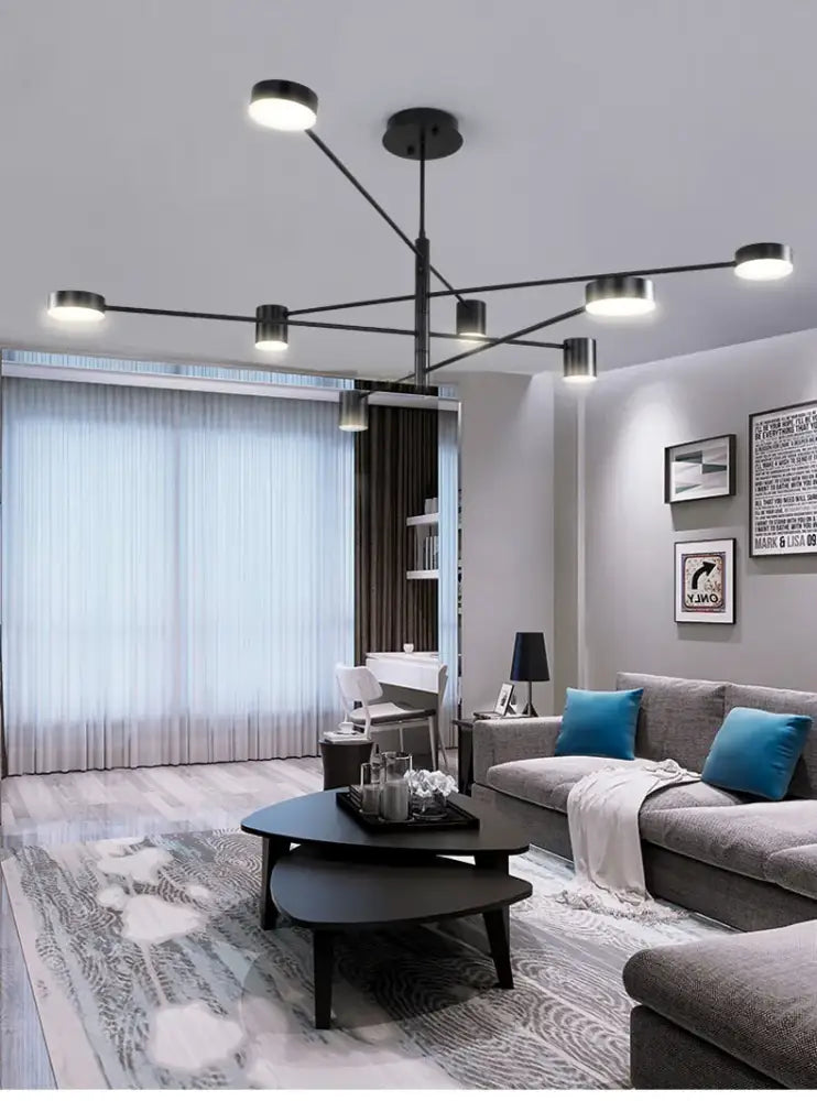 Modern black chandelier by DecorBites featuring multiple circular lights in simple black nordic style home lighting design