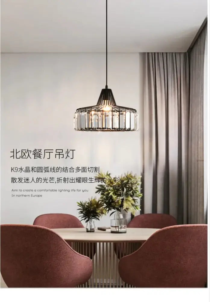 DecorBites™ modern black pendant lamp with crystal glass accents and nordic led crystal design above dining table