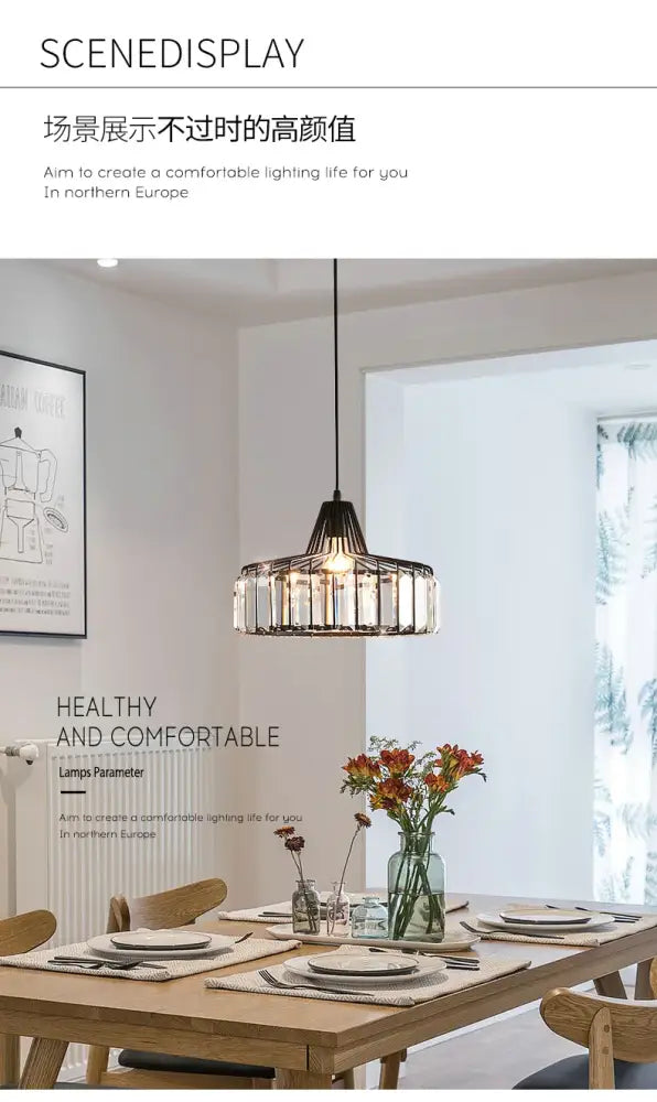 DecorBites™ modern black crystal LED pendant lamp with clear crystal glass panels hanging above wooden table