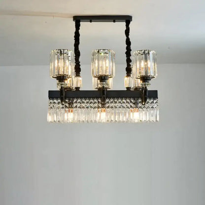 DecorBites modern black metal island pendant lamp with three clear glass candle shades and crystal prism fringe fixture width