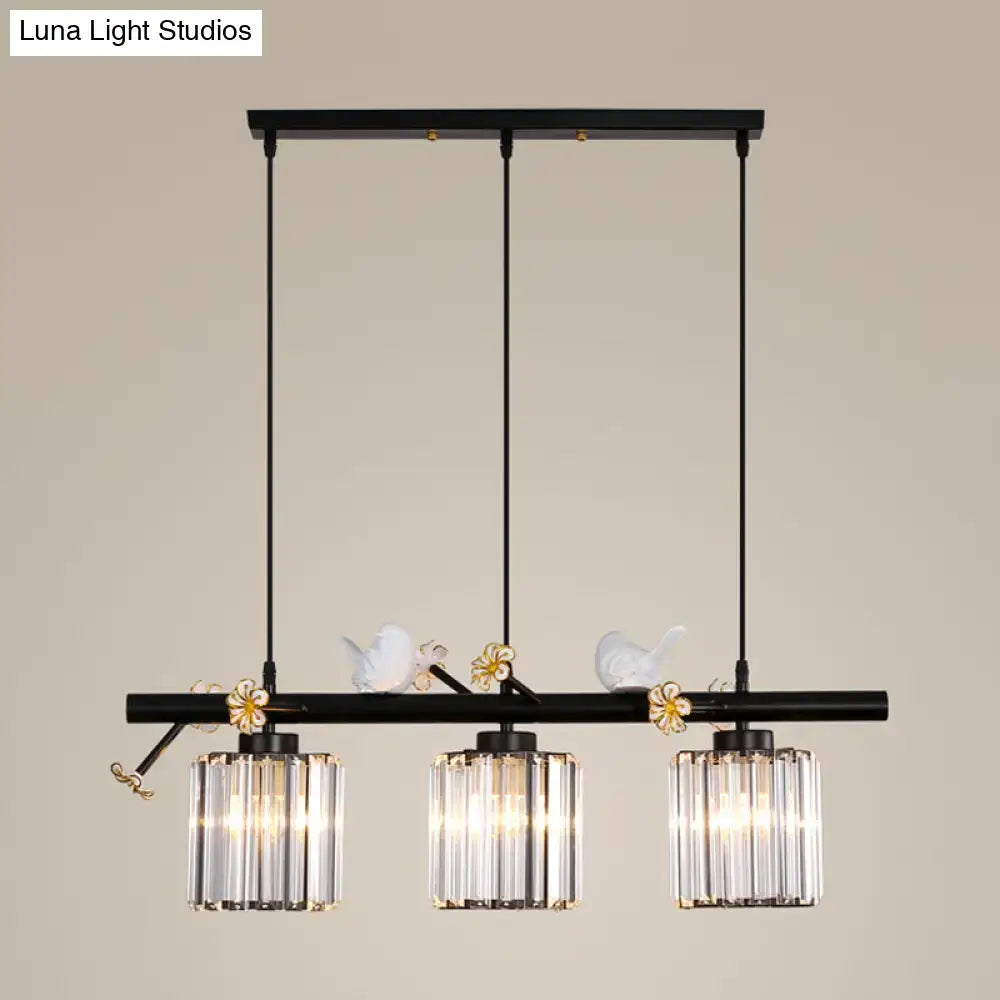 DecorBites™ modern black cylinder island light pendant with three crystal shades and decorative white ceramic birds