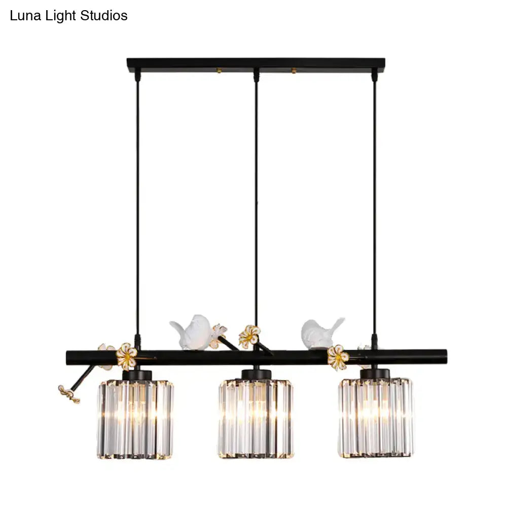 DecorBites™ modern black cylinder island light pendant with three crystal glass shades and decorative white bird figurines