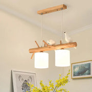 DecorBites™ modern branch island pendant light with wood fixture, cream glass shades, and bird accents for dining room ceiling