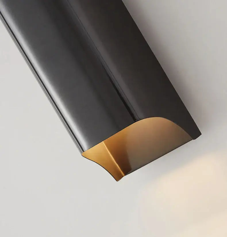 DecorBites wall lamp featuring modern brass led design with black and gold curved accent wall trim