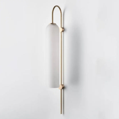 DecorBites™ modern brass wall sconce with a frosted white glass shade and slender brass wall frame ideal for pine green walls