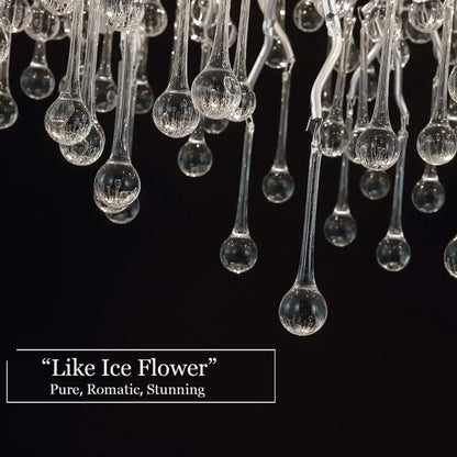 Clear glass teardrop elements with frosted detailing on decorbites™ modern chrome crystal chandelier for living room lamp package