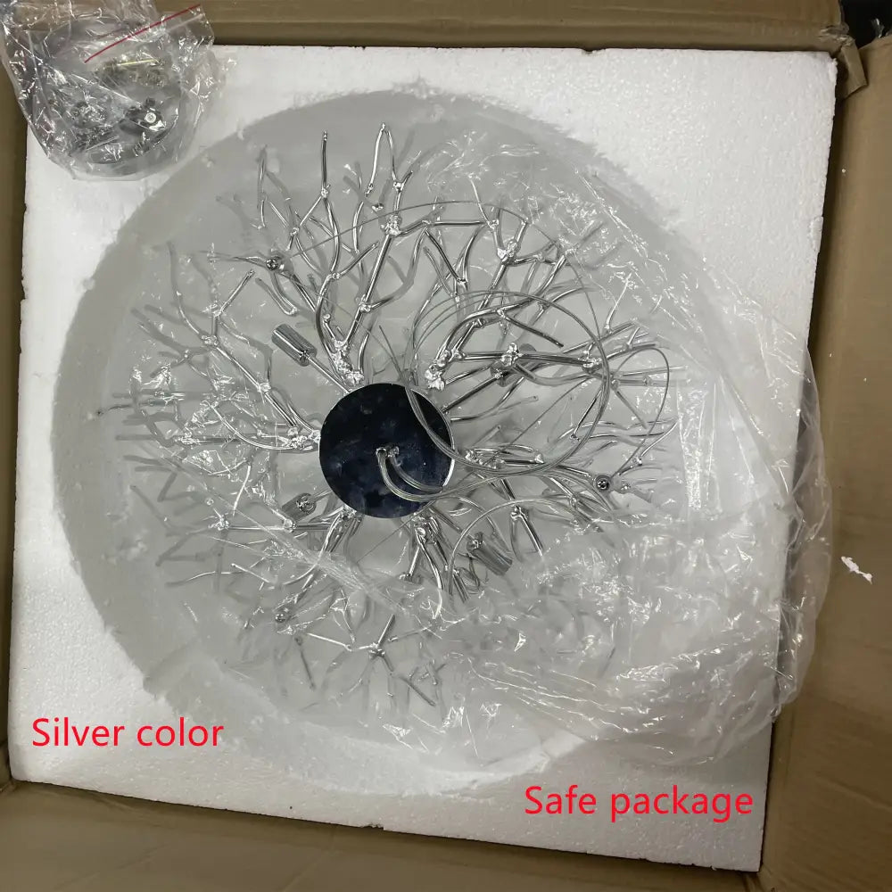 Silver-colored intricate branch-style DecorBites™ modern chrome crystal chandelier with dark base for living room lamp package
