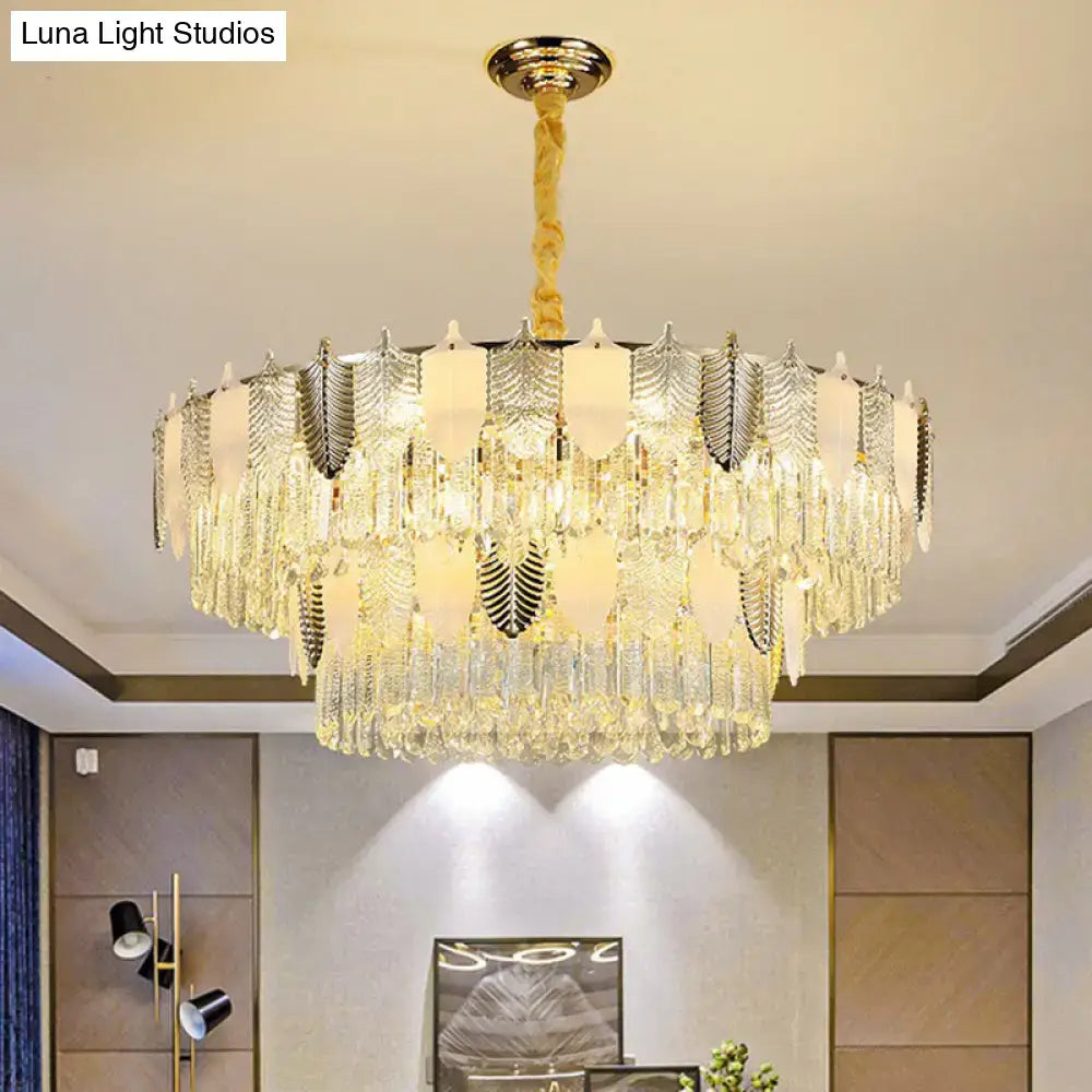 DecorBites modern clear crystal leaf pendant chandelier with gold-toned crystals and twisted brass chain ceiling light