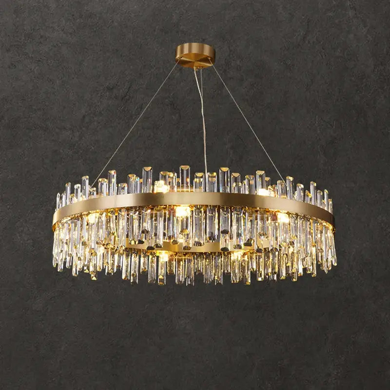 DecorBites™ modern crystal chandelier with gold-toned circular frame and cascading clear prisms for dining room lighting
