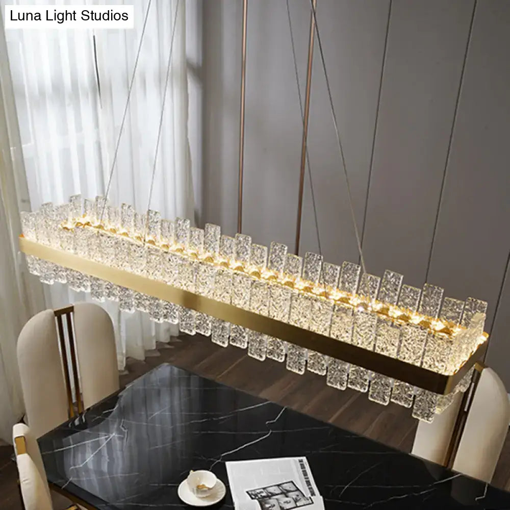 DecorBites modern crystal loop pendant light with brass plated frame and clear faceted crystals for elegant glow